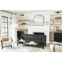 Elegant Fisher Floor Lamp with gold-leaf body, natural alabaster base, and linen shade in a living room.