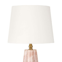 Joelle Mini Lamp with a pink quartz-like base, polished brass accents, and a white linen shade.