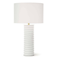 White Nabu metal column table lamp with accordion-like base and linen shade.