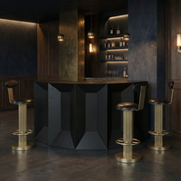 Petra Matte Black Industrial Bar with steel framing, modern design, and three gold-based bar stools.
