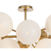 Shine Flush Mount with white swirled glass spheres and polished natural brass accents.