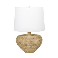 Avery Rattan Lamp with a heart-like woven base and a crisp white linen shade.