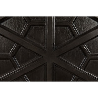 Close-up of a dark burnished mahogany hutch door with intricate geometric hand-carving.