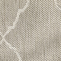 Close-up of a Portofino Grey flatwoven polypropylene outdoor rug with a subtle geometric pattern.