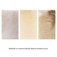 Three alabaster swatches showing natural variations in white, light beige, and warm brown tones.