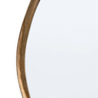 Close-up of Arbre Antique Gold Leaf Mirror's twisted, artisan frame with organic lines.
