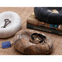 Lagoon Marble Bowl, a natural stone decorative bowl with unique veining, holding a watch.