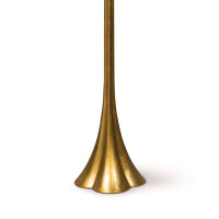 Lillian Floor Lamp base, featuring a sleek, modern, polished brass silhouette with a flared, scalloped design.