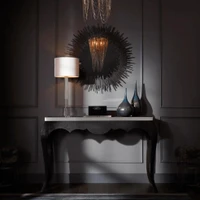 Borealis Graphite Mirror with delicate geometric iron strips in a modern bedroom setting.