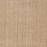 Close-up of a tan, hand-woven jute rug with a visible natural fiber texture.