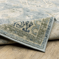 Branson Blue & Beige Traditional Rug, power-loomed polypropylene with classic design, curled corner showing woven back.