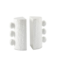 White cast metal Sanya Bookends with a paper mache-inspired texture and three spherical accents on each.