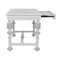 White mahogany office desk with spool-turned legs, carved apron, and an open drawer.