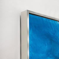 Ethereal Blue Giclee Canvas Painting, a close-up of the textured blue artwork with a sleek silver frame.