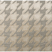 Beige mist throw pillow with a raised houndstooth pattern on a textured gray background.