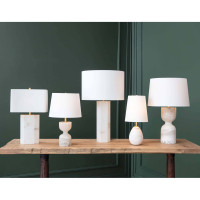 Jared Alabaster Mini Lamp with an oval alabaster base and elongated white linen shade.