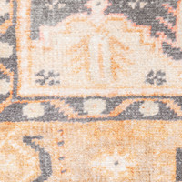 Close-up of a Sofia Gold & Charcoal Traditional Rug with distressed pattern, polyester chenille.