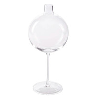 Clear glass vase with a spherical body and a slender wine glass stem on a round base.