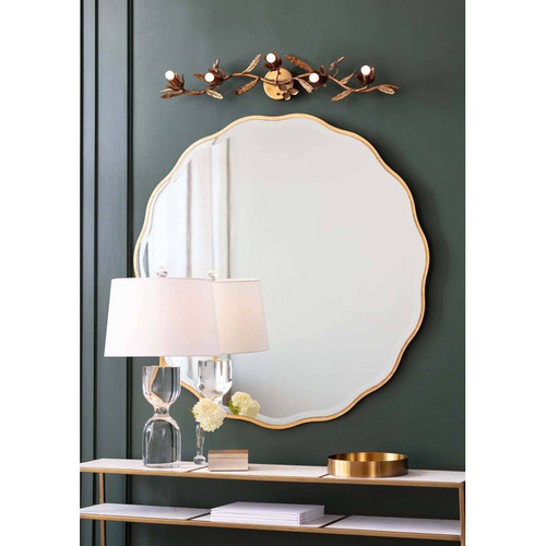 Echelon Console Table with white marble top and natural brass frame, styled with a lamp and decor.