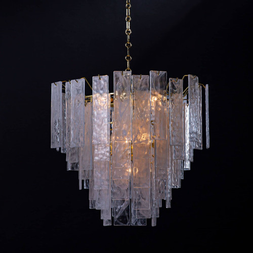 Small Glacier Chandelier with clear water glass panes and white swirls, creating a soft glow.