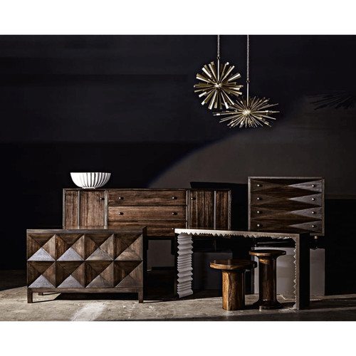 Ebony walnut chest with diamond carvings, matching dresser, and side tables under sputnik chandeliers.