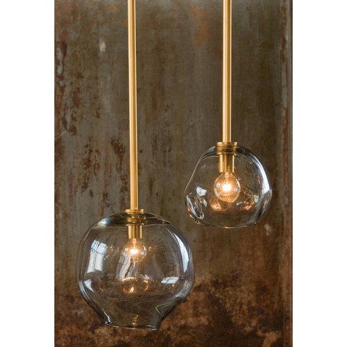 Two Molten Pendant Large Smoke Glass lights with natural brass pipes, featuring organic, artisan-crafted forms.