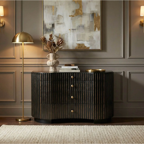 Irene curved black dresser with handcarved vertical fluting, gold pinstripes, and brass pulls.