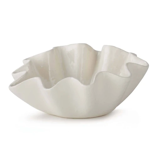 Large creamy white ceramic bowl with distinctive ruffled edges.