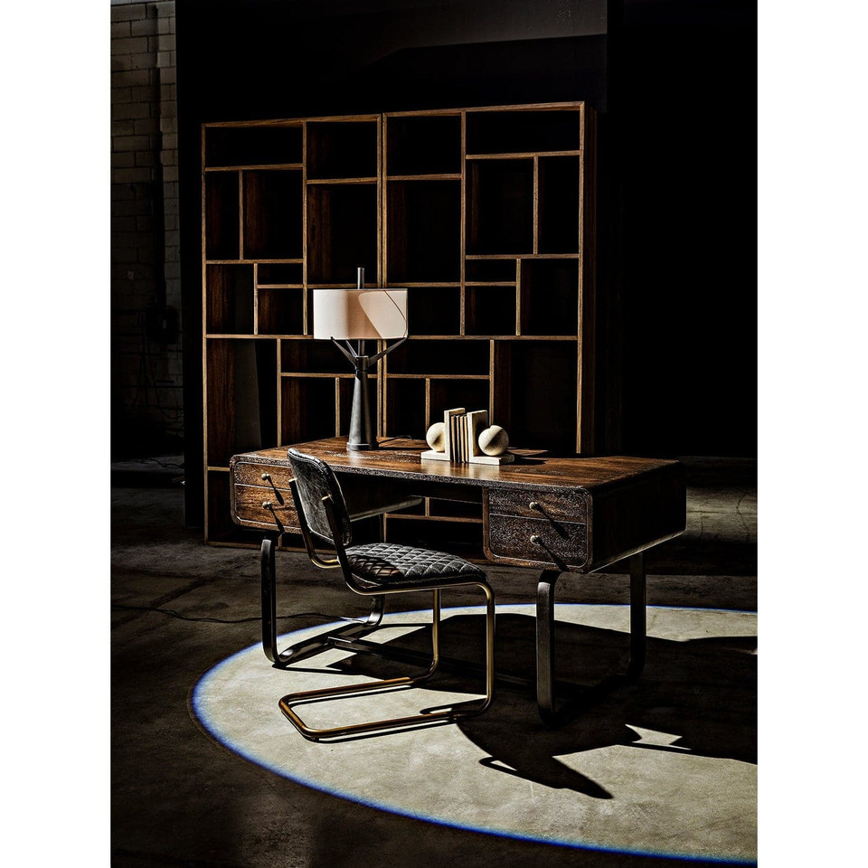 Malic Dark Walnut Bookshelf, 88"H, with varied cubbies behind a dark wood desk and chair.