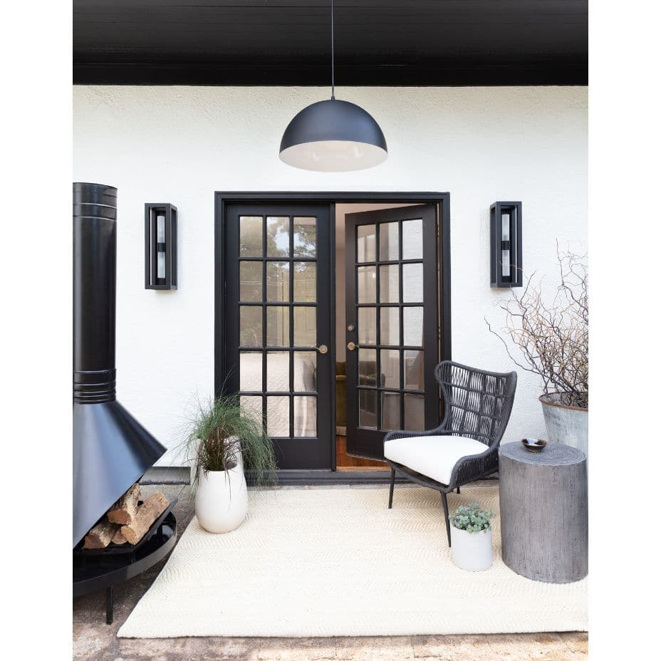 Montecito Up-Down Outdoor Sconce: Charcoal steel box with double-ended sconce, 24" high, flanking black French doors.