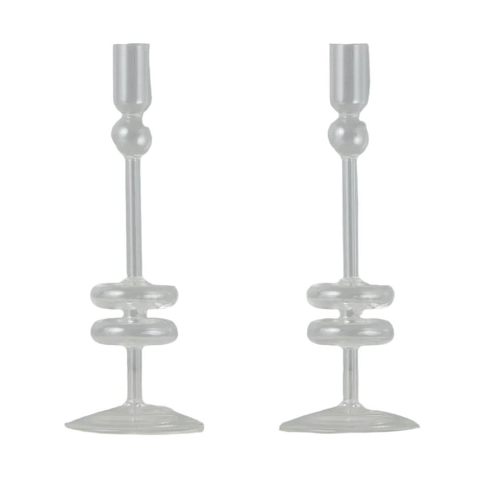 Pair of medium clear glass candlesticks with elegant, timeless design for taper candles.
