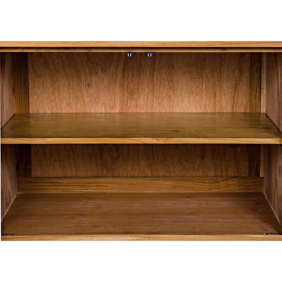 Interior of a Brook Teak & Sea Grass sideboard, showing two empty wooden shelves.