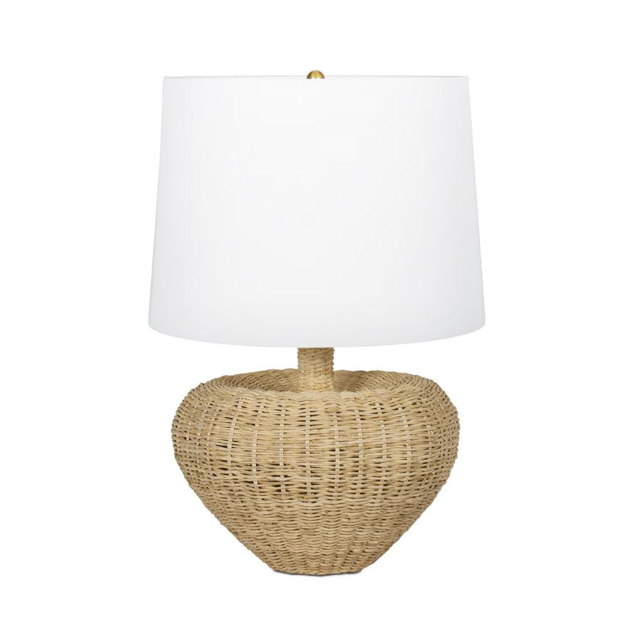Avery Rattan Lamp with a heart-like woven base and a crisp white linen shade.