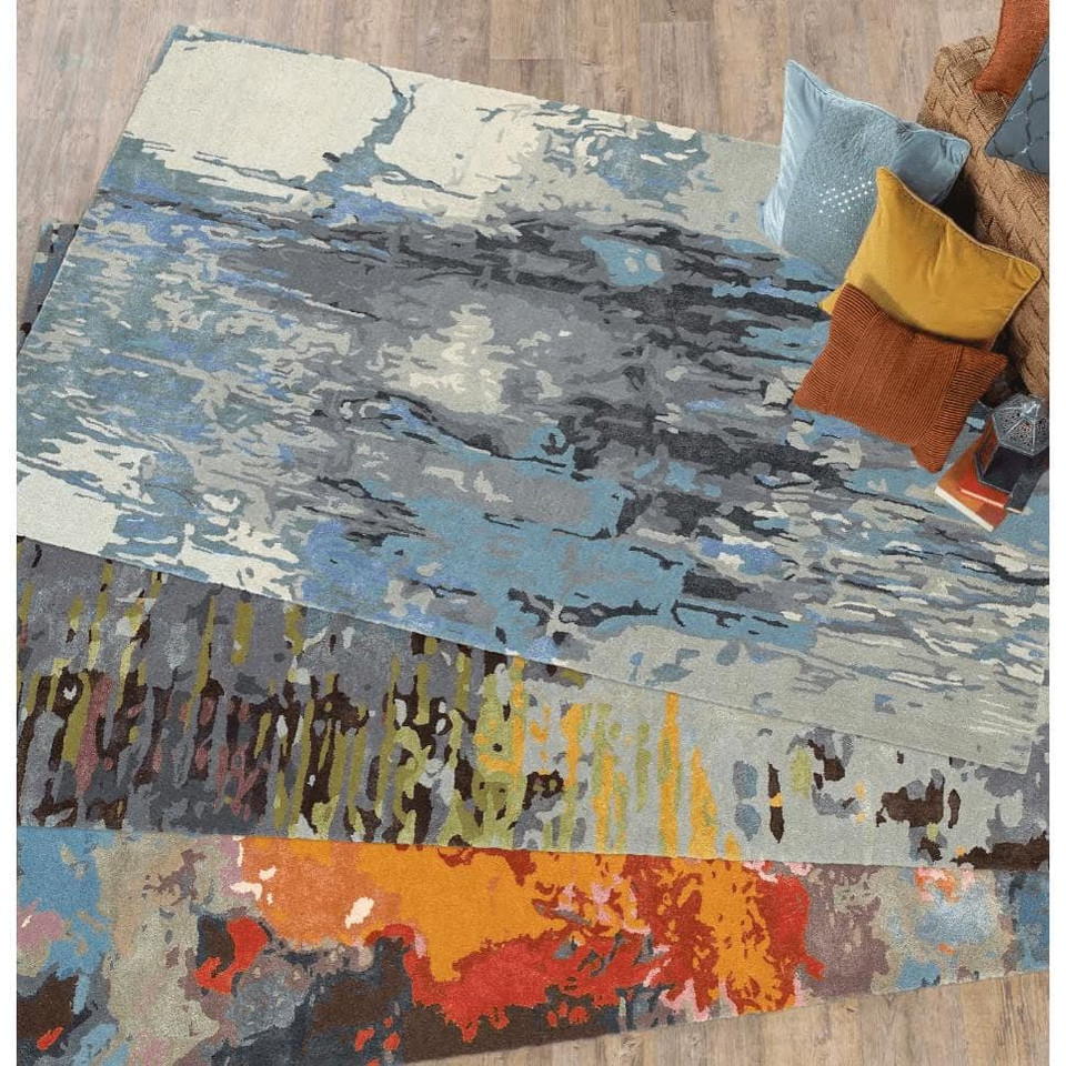 Galaxy Blue & Grey Contemporary Rug with abstract patterns, wool and viscose, shown with accent pillows.