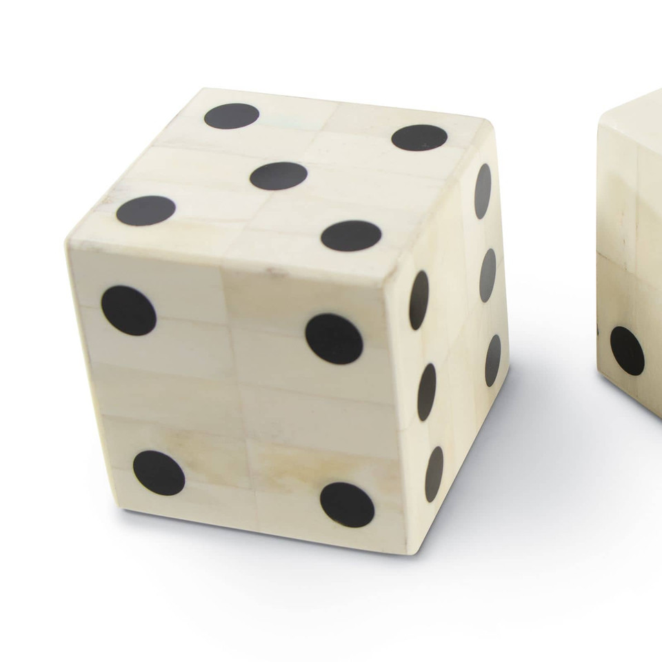 Oversized bone dice with inlaid bone tiles and black pips, 3.75" square.