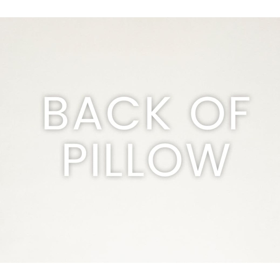 Back of the Posh Duo Royal Navy Pillow, showing its solid polyester fabric and seamless zippered cover.