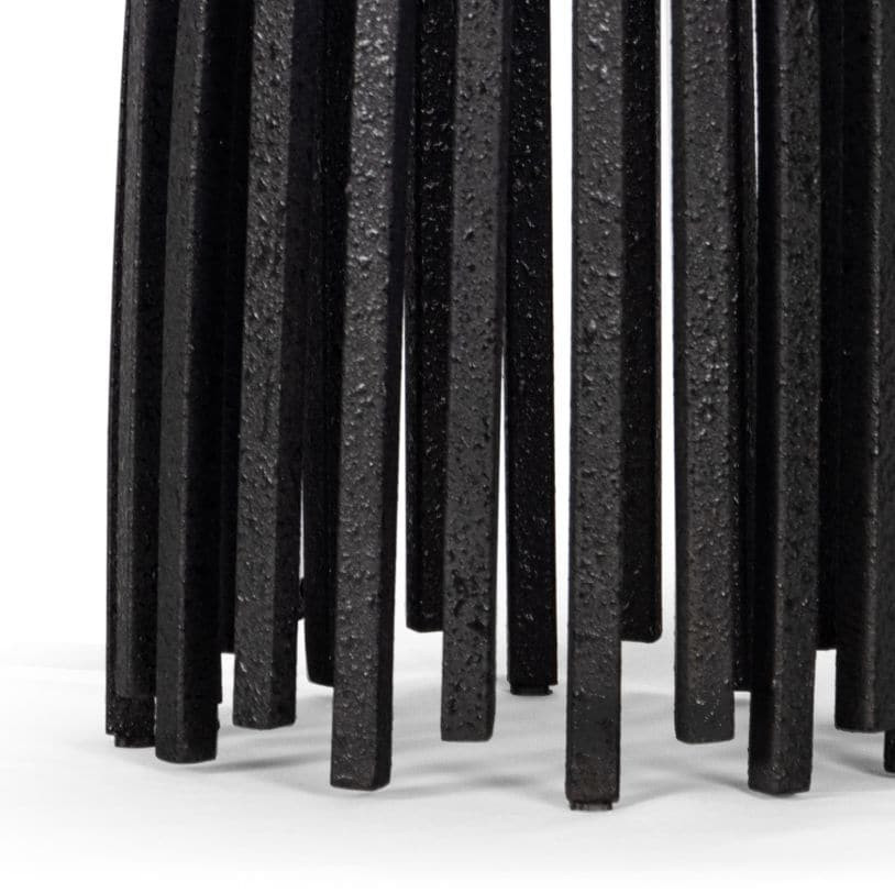 Close-up of the Webbed Table Lamp base, featuring sculpted blackened iron metal rods with a textured finish.