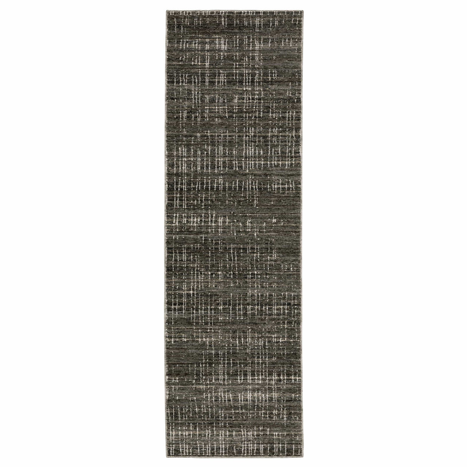 Long, rectangular charcoal and grey polyester rug with a modern abstract pattern.