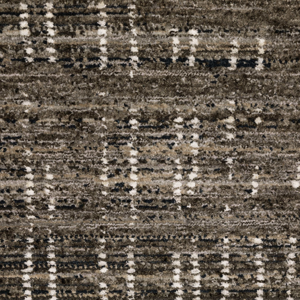 Close-up of a Nebulous Charcoal & Grey Casual Rug with a modern abstract pattern and soft polyester yarns.