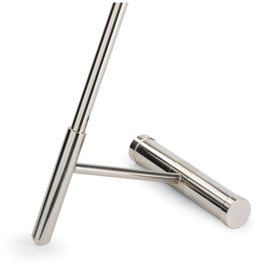 Close-up of Spyder accent table's nickel brass metal base with unique kickstand design.