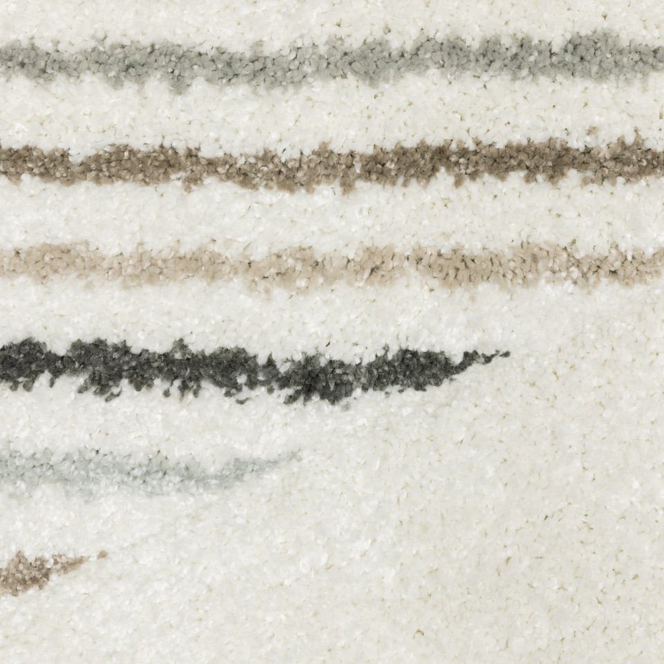 Cambria Beige & Multi Casual Rug, close-up of soft polypropylene with textured beige, gray, and pale blue stripes.