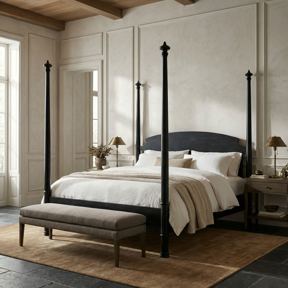 Douglas Four Poster Bed in hand-rubbed black mahogany with decorative finials, white bedding, and a beige bench.