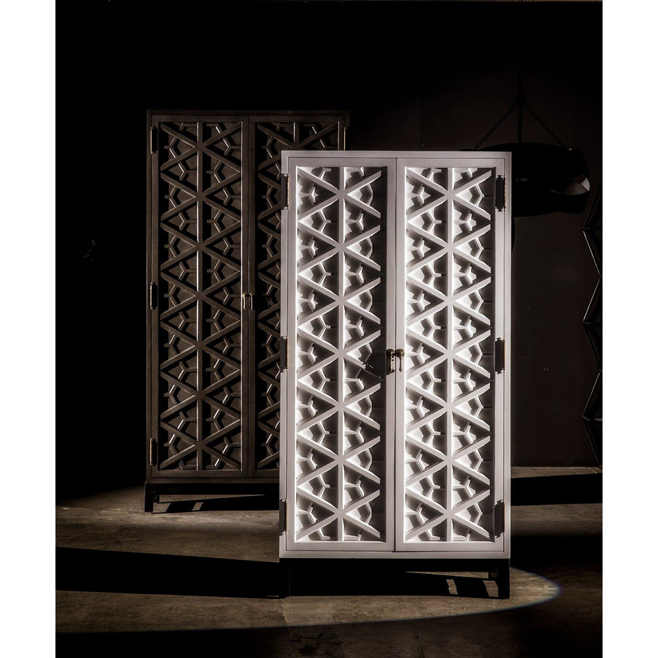 White mahogany hutch with intricate hand-carved geometric doors, next to a darker burnished mahogany version.