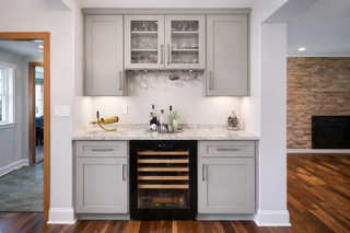 Custom built-ins media center designed for a recessed wall with integrated storage