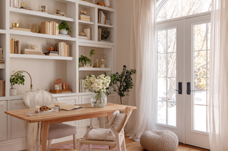 Custom built ins bookcase with classic wood shelving and traditional detailing