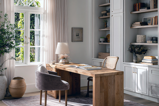 Custom built ins bookcase wall with floor-to-ceiling shelving layout