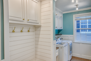 Custom mudroom built-ins DIY project by homeowner using RTA cabinets