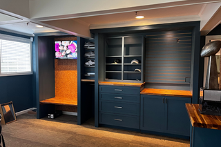 custom built ins navy shaker wardrobe with crown molding and adjustable shelving