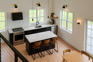 Custom kitchen cabinets in satin black shaker thermofoil by customer Mary Jo small new-build kitchen project
