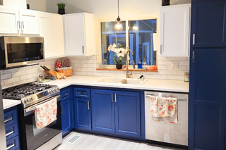 Custom kitchen cabinets in a two-tone blue kitchen from customer Paul budget-friendly modernization